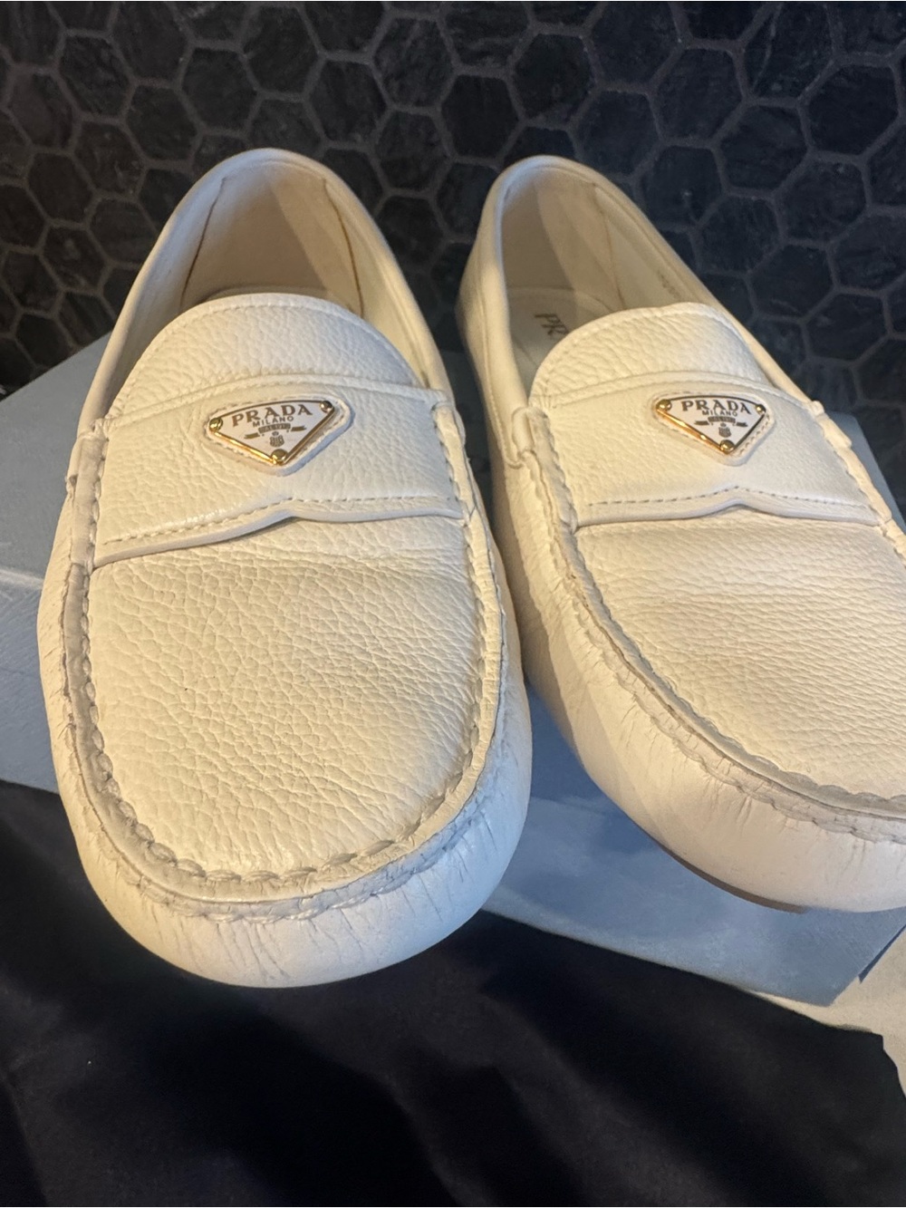 Prada White Pebble Leather Slip-On Loafers with Gold Logo